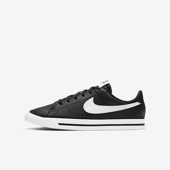 Boys black and white nike on sale